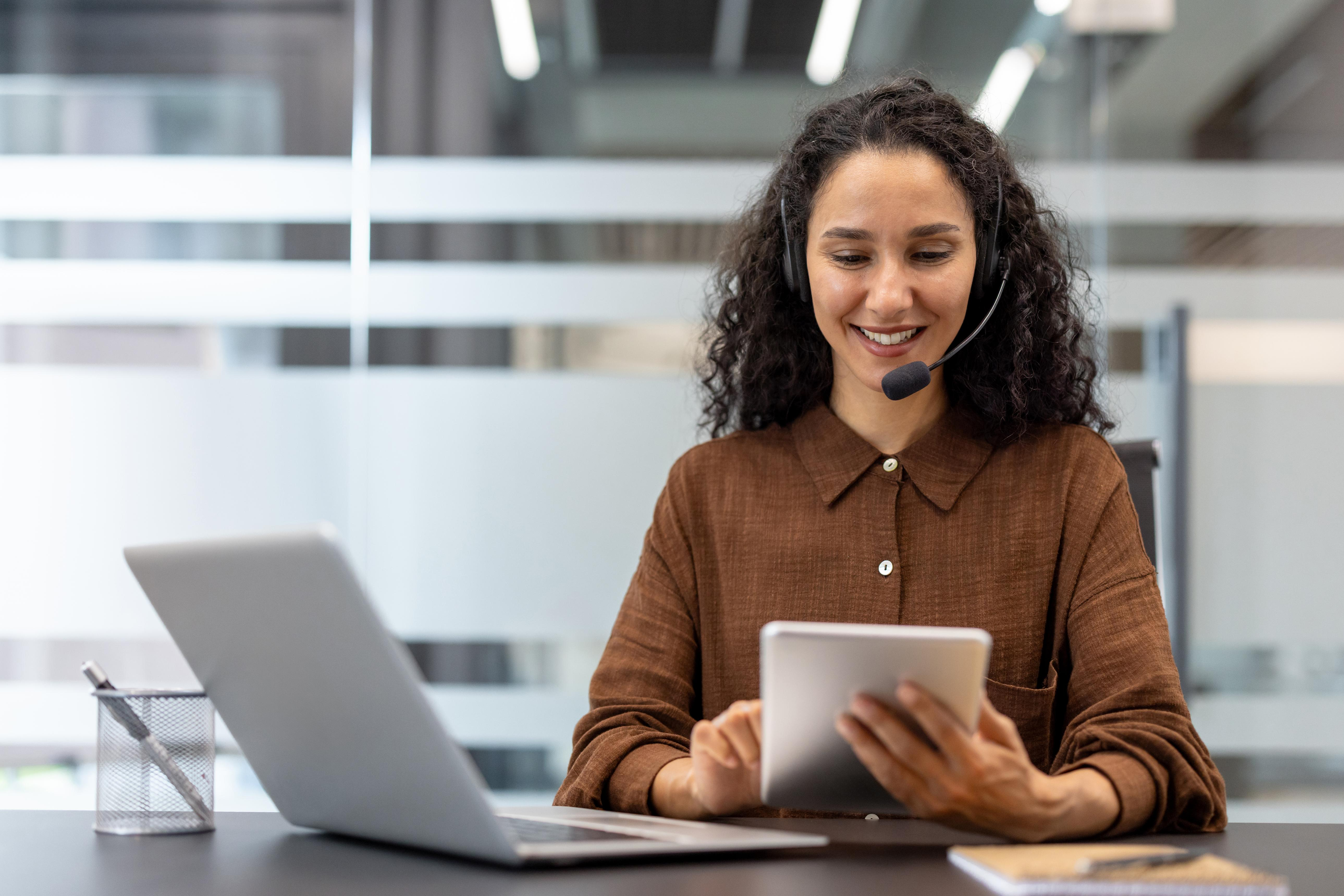 Support representative helping customer online
